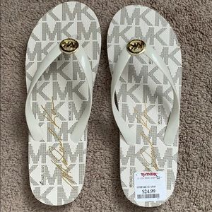 Michael Kora white flip flops